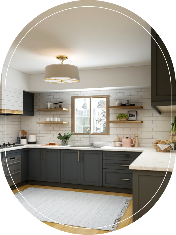 A kitchen with black cabinets and white counters.