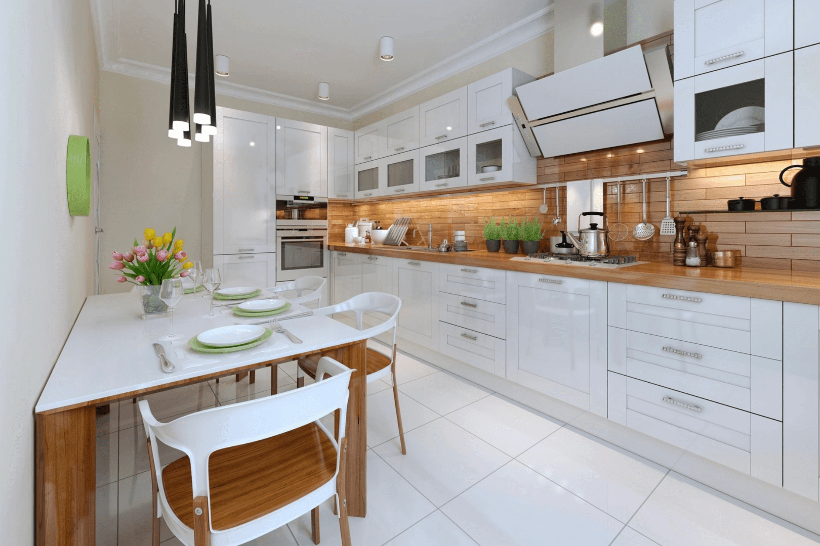 A kitchen with white cabinets and a table